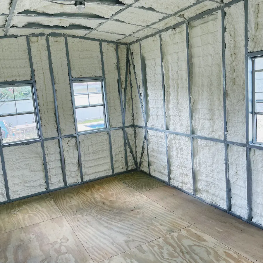 Closed-cell spray foam insulation applied to wall cavities in a residential project in Fayetteville