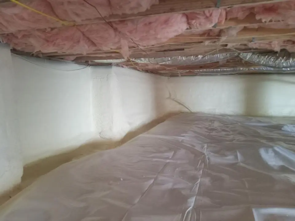 Crawl space encapsulation with closed-cell spray foam for Storm Damage Roof Repair in Fayetteville